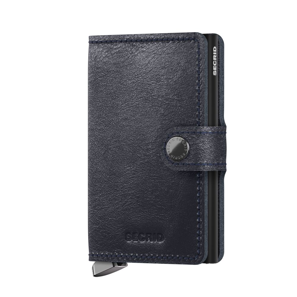 Secrid Slimwallet aus Leder in Marineblau mit Knopfverschluss und Kartenhalter-Mechanismus